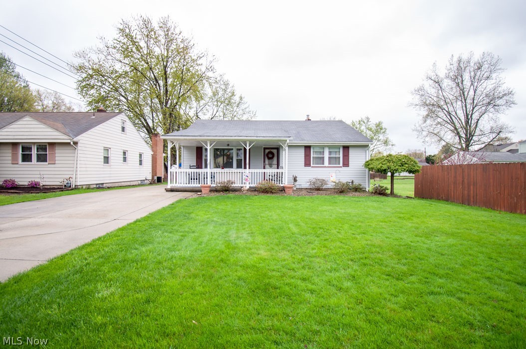 Updated move in ready ranch that offers a front covered porch to enjoy the landscaping during the spring and summer weather! An eat-in kitchen with updated appliances, plenty of cabinet storage and ceramic tiles that is open to the living room. Three bedrooms and one bathroom on first level. Hardwood floors under all carpet in bedrooms and living room. On the lower level, features a finished rec room with a pool table, laundry room, and full bathroom. The backyard is fenced in with gate, and shed for additional storage. Updates include: Updates in the last 5 years include, vinyl siding, blown in insulation in the walls and roof,central air, updated windows and doors. Ready for you to just move in!