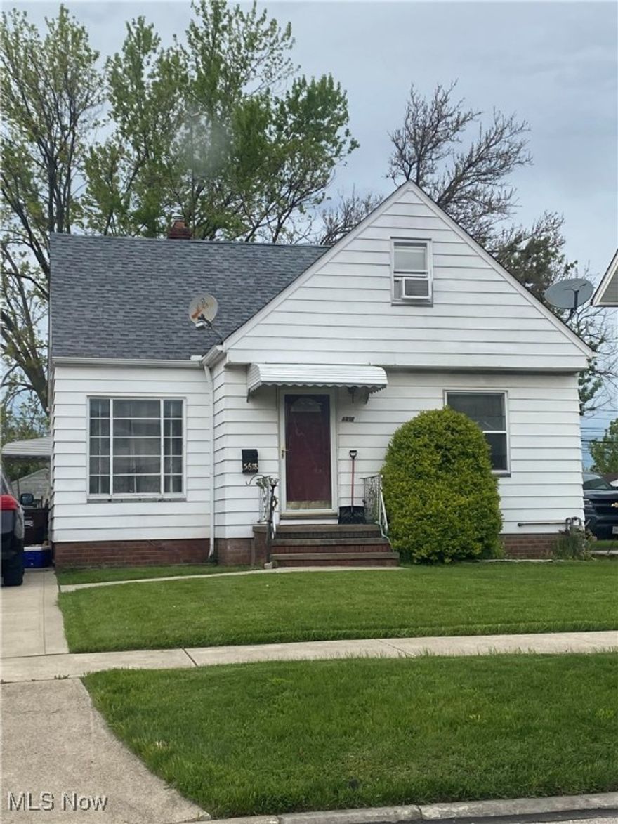 This is a lovely home on a well-maintained street which just needs some TLC.  The hardwood floors throughout the home are solid and ready to be brought back to life.  There are 2 bedrooms on the first floor and a third upstairs with a nice size bonus room off of it overlooking the front yard.  One bedroom on the first floor has had a large entryway opened up off the kitchen years ago, so that it could be utilized as a dining room.  The versatility of this space is a plus. 
 And, the kitchen runs along the back of the house with lots of cabinet room, countertop space and a view to the partially fenced backyard.  The microwave, range and refrigerator all remain with the home as do the window treatments.  The upstairs bedroom has a large walk in closet, ceiling fan and and even a generous open space at the top of the steps.  The basement stairs enter into the utility room section and to the right is a partially finished large room with an additional, unfinished room for extra storage.  The one car garage is detached.