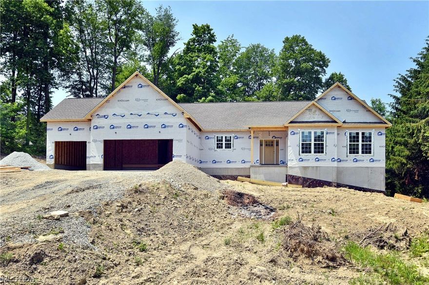 Wanting to build but not wanting to wait?! Looking for a gorgeous ranch home on acreage and with a water view?! Then this is the **perfect** listing for you! Currently in the mechanical stage of construction, this spacious home is scheduled to be completed at the end of August and will be ready to move right in. Directly across the street from beautiful Lake Hodgson and close to Sandy Lake, this property will provide a serene, private feel and amazing views along with well over an acre and a half of land. Make sure to ask your agent to take a look at the incredible floor plan which includes an open floor plan kitchen, dining, and great room area. 4 large bedrooms, 3 full baths, a first floor laundry, mud room, and office round out the first floor.  Extra tall sliding glass doors and floor to ceiling double hung windows will provide plenty of natural light throughout.  This home will also have a partially finished walk-out basement including theatre room and full bath.  All the selectio