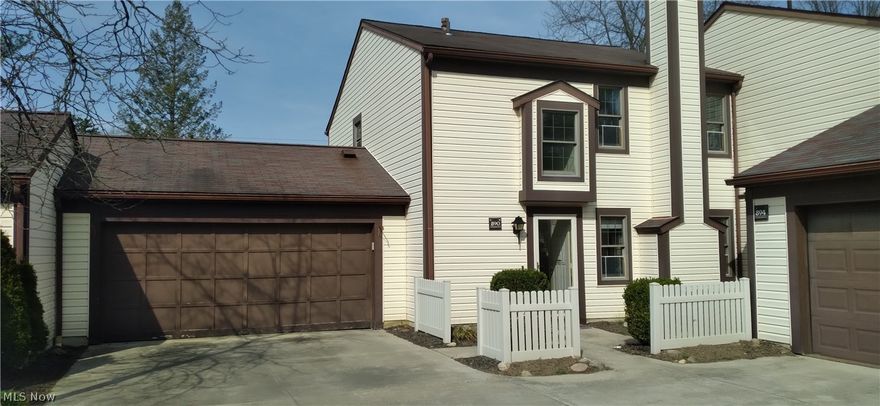 2 bedroom, 1.5 bath two-story condominium. A welcoming foyer leads to an open living room with wood-burning fireplace and dining room that leads out to a private fenced in patio. Spacious eat-in kitchen with appliances that will remain including refrigerator, range, microwave, and dishwasher. Large master suite has plenty of room for furniture and a walk-in closet. Two-car attached garage is another benefit to this condo. Eagles Chase offers a clubhouse and pool and is perfectly located just minutes from Montrose/Fairlawn/Merriman Valley shopping & dining.