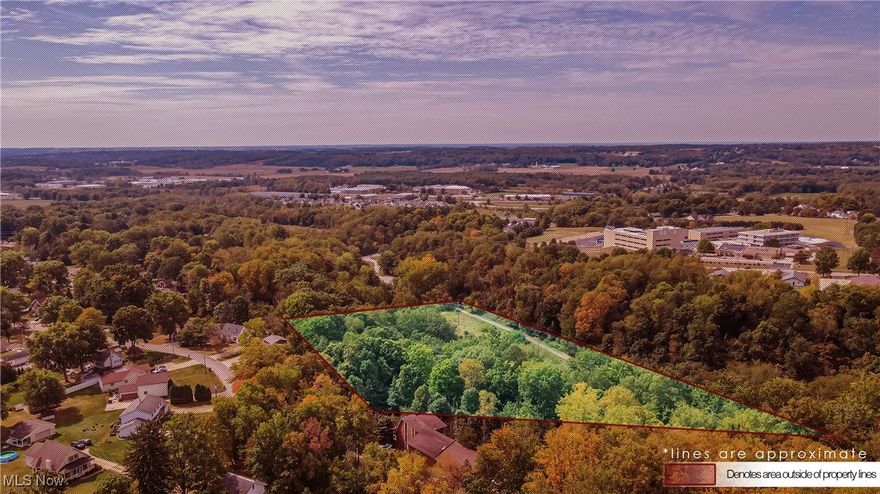 Time to bring your builder to 612 College Street in Wadsworth! Nestled on a serene 3.27-acre wooded lot, this property offers the perfect blend of privacy and convenience. Enjoy stunning views of the creek and Holmesbrook Park right from your future home! Picture yourself relaxing as the sun sets over the valley. Located close to parks, Downtown Wadsworth, and with easy access to the highway, this property is a rare find. Don’t miss the chance to build your dream home—schedule your appointment today!