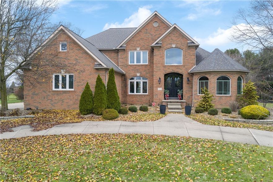 Looking for the perfect Christmas gift? This Monticello manor is perfect for even the pickiest hard to shop for ones we love! This totally private backyard oasis complete with inground pool & new pool heater. This illusion backyard is the best of both worlds, overlooks 50 perfectly manicured acres w/ no neighbors in sight of which you don't have to maintain but get to enjoy the view! This grand estate has so many luxury upgrades throughout recently completed. Inside, nearly 6,000 sq. ft. of living space features a soaring 2 story great room, updated gourmet kitchen with Café appliances, first-floor master suite, theater room, and custom bar just to name a few! Recent upgrades include new HVAC, pool heater, hot water tanks, sump pump, paint, carpet, smart irrigation (2022), kitchen, pantry, bath, laundry & mudroom makeovers (2023), all new windows and doors with lifetime warranty plus a grand double-door entry (2024), and a new bar top with full home security system (2025).

Enjoy the octagon shaped sunroom with a soaring vaulted ceiling!
Schedule your private showing today and experience the elegance, privacy, and quality this home offers!