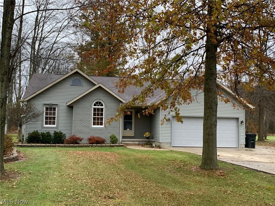 Twenty years new on this 3 bedroom 2 bath ranch home!  Great curb appeal.  Open floor plan with cathedral ceilings.  Living room with gas fireplace, bright and cheery kitchen is fully equipped with all appliances.  Dining area has hardwood floors and a sliding door to your deck.  Large master bedroom has its private bath with whirlpool tub and large walk-in closet.  Other 2 bedrooms are nice size.  First floor laundry is a plus! Full basement is 12 course and could easily be finished. 
 All this with a 2 car attached garage and for the man of the house a 2 car detached garage  (24x30 with oversized 9 foot door).  Fresh paint, new water tank, and newer water softener and a/c are all added pluses. Seller will escrow for septic.