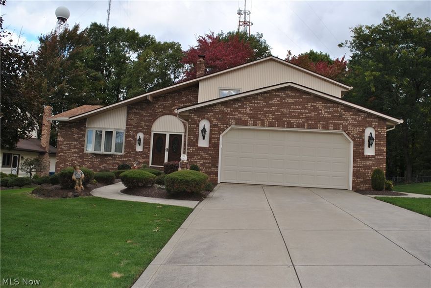 One-owner. Maintenance free exterior. Custom built 4-Level Split with 2-story ceramic entry. 4 Bedrms, 2.5 baths. Spacious family rm with wood burning fireplace with sliders to stamped covered patio with natural gas grill. Beautiful updated kitchen with all appliances. Large vaulted living & dining rms. Modern & updated bathrms with easy maintenance 1-piece shower & bath units. Plenty of storage or expansion in the 3/4 basement plus 2-car attached garage. Excellent condition with all neutral decor throughout plus a wooded rear lot. Windows & doors 2012. Garage door 2010. Roof 2008. Kitchen appliances 2012. Driveway 2010. Furnace & air 2012. H2O tank 2013. Shed 2015. Glass block windows, security system, underground electric fence. Max winter heat bill $150 per month. Convenient location in south Parma.