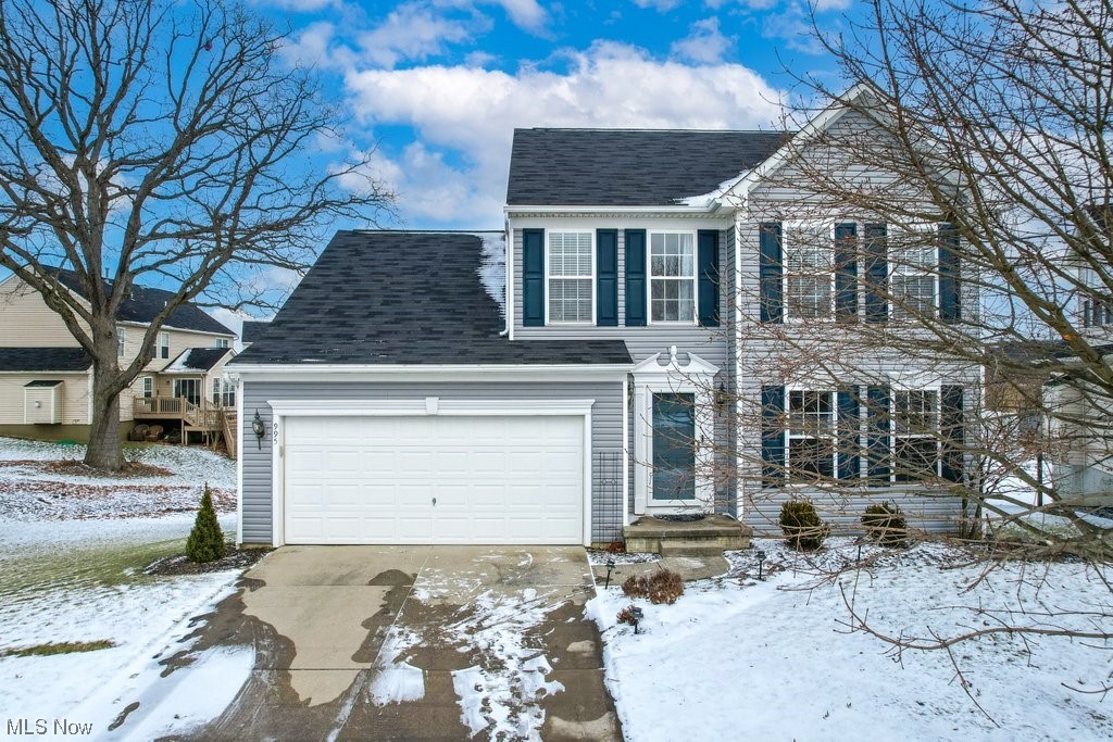 Welcome to The Lakes of Franklin Mills in Kent, Ohio! Located on a waterfront lot on a quiet cul-de-sac, this beautifully maintained home with newer Vinyl siding (2021) offers over 2,900 sq ft of finished living space, featuring 4 bedrooms & 3.5 bathrooms, plus an open & bright floorplan with plentiful windows & fresh neutral paint throughout. A cozy living room & half bath are located right off the entryway & open to the kitchen & carpeted morning room – both with water views. The large kitchen is equipped with an oversized island w/seating, custom cabinets with pull-out storage racks, all appliances (most replaced ~ 5 years) & connects to a vaulted dining room overlooking the water. The slider from the dining room leads to the large maintenance-free composite deck & newer railings (2022) & spiral staircase that provides access to the ground level patio under the deck, another brick-paver patio, backyard, & pond. A convenient laundry room is also located on the main level adjacent to the 2-car garage. Head upstairs to a full bath and 3 carpeted bedrooms, including the primary bedroom suite with vaulted ceilings, water views, walk-in closet,& ensuite bath w/walk-in shower & dual vanity sinks. The fully-finished walkout basement w/newer plush carpeting (2022) includes a 4th bedroom & a full spa-like bath w/custom ceramic tile steam shower and heated LVP floors, a living room, and a sitting room with bar – perfect for recreation or use as an In-Law suite! The walkout leads directly to the private patio or to the pond for some fishing! Enjoy a wide range of outdoor activities including a groomed hike/bike trail, nature preserve, sports fields, & multiple lakes. Conveniently located near both downtown Kent and Stow, this home provides the best of both worlds – a serene waterfront retreat with the convenience of nearby amenities. Newer hot water tank (2021) & included Home Warranty provide peace of mind to the new homeowners. Make an appointment today before it’s gone!