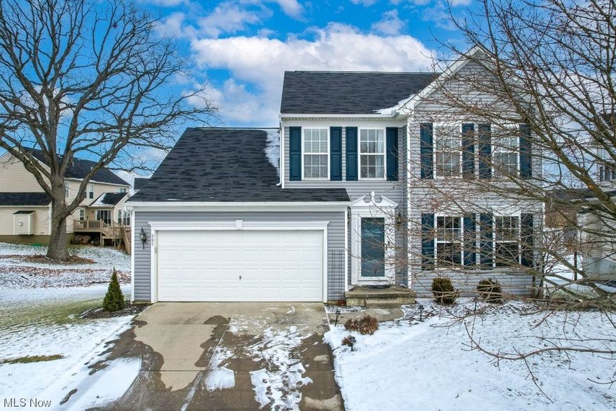 Welcome to The Lakes of Franklin Mills in Kent, Ohio! Located on a waterfront lot on a quiet cul-de-sac, this beautifully maintained home with newer Vinyl siding (2021) offers over 2,900 sq ft of finished living space, featuring 4 bedrooms & 3.5 bathrooms, plus an open & bright floorplan with plentiful windows & fresh neutral paint throughout. A cozy living room & half bath are located right off the entryway & open to the kitchen & carpeted morning room – both with water views. The large kitchen is equipped with an oversized island w/seating, custom cabinets with pull-out storage racks, all appliances (most replaced ~ 5 years) & connects to a vaulted dining room overlooking the water. The slider from the dining room leads to the large maintenance-free composite deck & newer railings (2022) & spiral staircase that provides access to the ground level patio under the deck, another brick-paver patio, backyard, & pond. A convenient laundry room is also located on the main level adjacent to the 2-car garage. Head upstairs to a full bath and 3 carpeted bedrooms, including the primary bedroom suite with vaulted ceilings, water views, walk-in closet,& ensuite bath w/walk-in shower & dual vanity sinks. The fully-finished walkout basement w/newer plush carpeting (2022) includes a 4th bedroom & a full spa-like bath w/custom ceramic tile steam shower and heated LVP floors, a living room, and a sitting room with bar – perfect for recreation or use as an In-Law suite! The walkout leads directly to the private patio or to the pond for some fishing! Enjoy a wide range of outdoor activities including a groomed hike/bike trail, nature preserve, sports fields, & multiple lakes. Conveniently located near both downtown Kent and Stow, this home provides the best of both worlds – a serene waterfront retreat with the convenience of nearby amenities. Newer hot water tank (2021) & included Home Warranty provide peace of mind to the new homeowners. Make an appointment today before it’s gone!