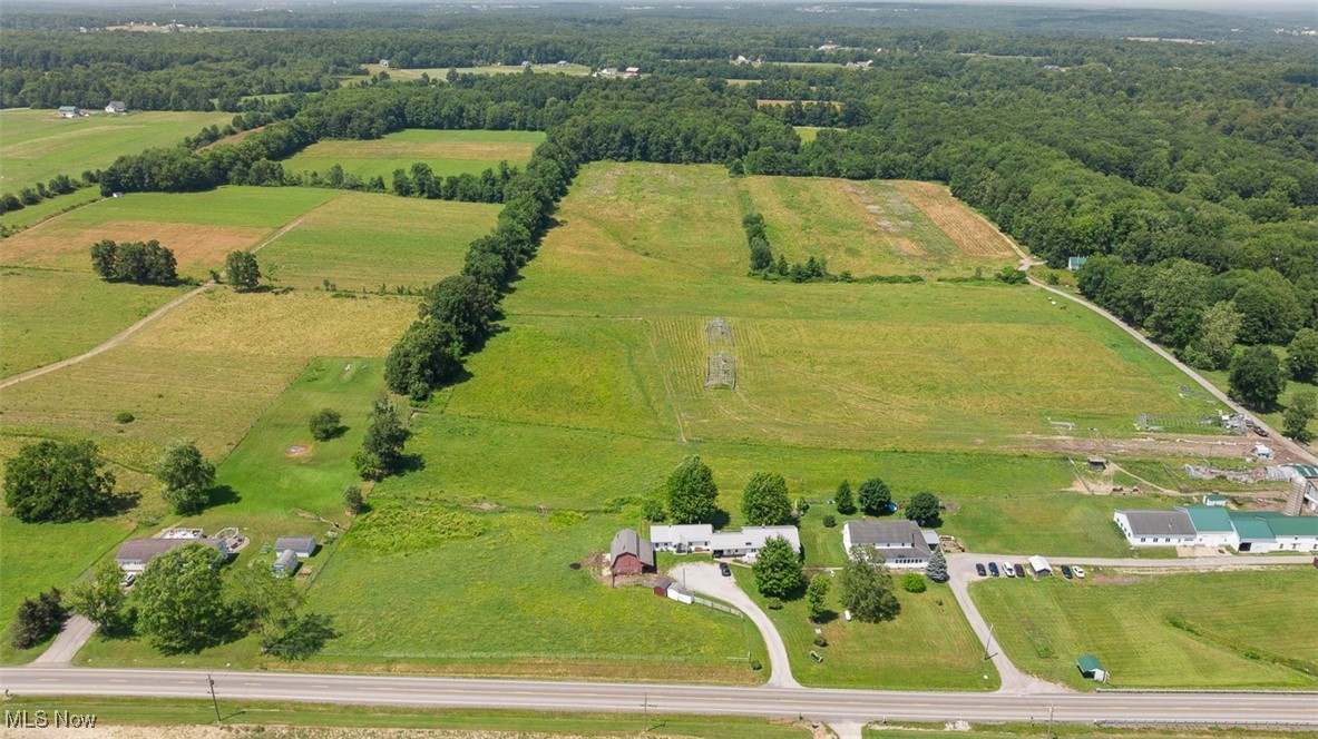 87-Acre Farm, Two Homes, Buildings, Maple Syrup Operation. Tillable/Wooded Land, Offered in Four Parcels & Entirety. Geauga County, Parkman Township, Cardinal Schools. Live Auction with Online Bidding Available. ABSOLUTE AUCTION, all sells to the highest bidders on location. ONLINE BIDDING BEGINS MONDAY, AUGUST 11, 2025, at 12:00 PM, and AUCTION LIVE ON-SITE BIDDING WILL BEGIN WEDNESDAY, AUGUST 13, 2025, at 6:00 PM. Parcel #4: 17.2 acres of vacant land. NOTE: The farm has been certified organic for the past 7 years. Farm will be offered separate and together, selling the way that brings the most money. Walk this land with permission only. Call the auctioneer for viewing.