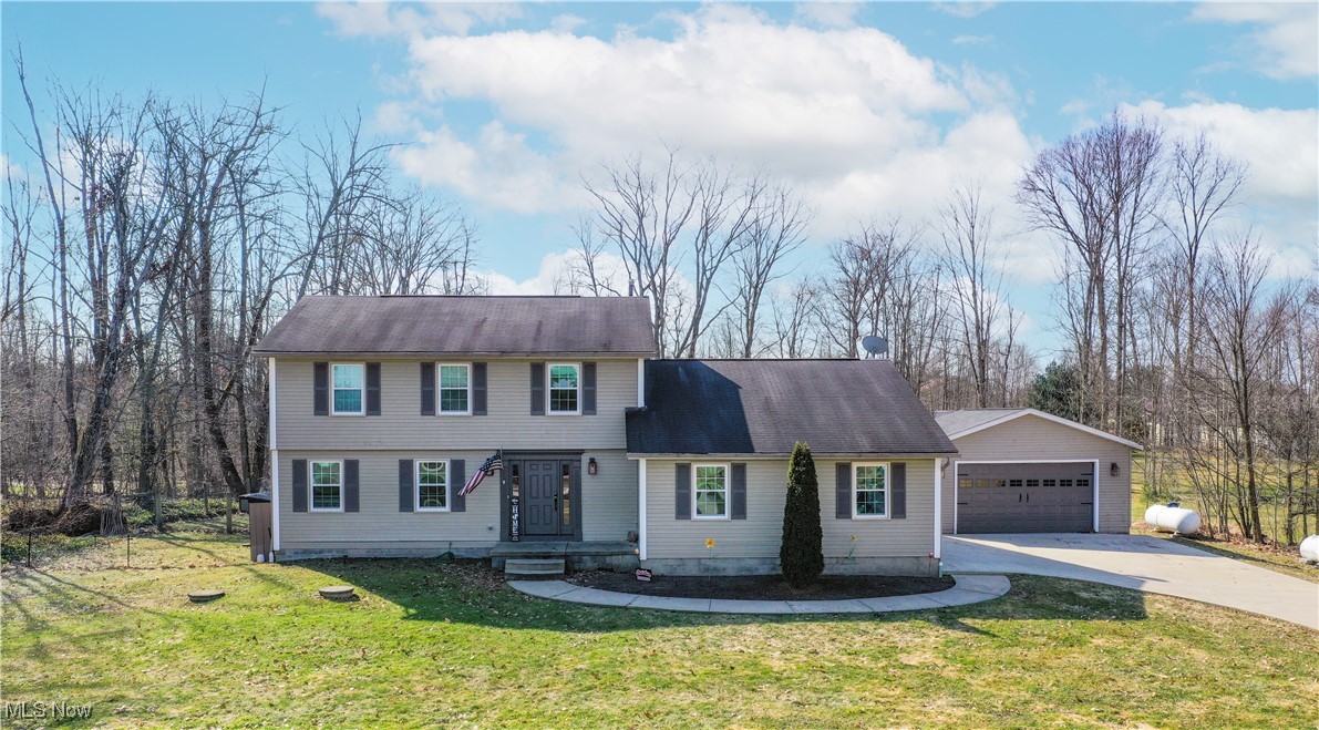 IMPECCABLY REMODELED Colonial on 1.59 Acres with Detached Heated Garage! Move-in ready and packed with extras.
Beautifully remodeled & maintained 4-bed, 2.5-bath Colonial on a quiet dead-end street in a private development. The open-concept main floor features an oversized kitchen with KraftMaid cabinetry, epoxy countertops, custom lighting, newer appliances, and reverse osmosis system. Seamlessly flowing into the dining and family rooms, this main living area invites connection and comfort. The dining area showcases a stylish accent wall and designer lighting, while the cozy family room is anchored by a gas fireplace, perfect for chilly evenings. Stylish sliding barn doors offer flexible use of the main floor layout including the living room/home office for today's modern family. Enjoy engineered hardwood, waterproof LVT, and newer carpet throughout creating both beauty and durability. Upstairs you will find the bedrooms and 2 bathrooms including the ensuite master bathroom. Downstairs, enjoy your own private home theater and recreation space with soundproofed walls, a projector screen, dry bar, and plenty of room to play, work, or unwind. Storage abounds with a raised crawlspace and a large laundry/utility room.
Outside, relax in the backyard oasis with your fenced yard, hot tub, covered patio, and large deck (swimming pool & playground will be removed). Two garages: an attached 2-car and Car enthusiasts, hobbyists, or entrepreneurs will appreciate the Bonus detached 2-car which is heated & insulated with 220V power and three large windows—ideal for a workshop, home business, gym, or creative studio.
Generac whole-house generator (2013), new concrete driveway & walkways, and a 1-year home warranty included. Don’t miss this opportunity to own a truly exceptional home in a desirable location—schedule your private showing today!