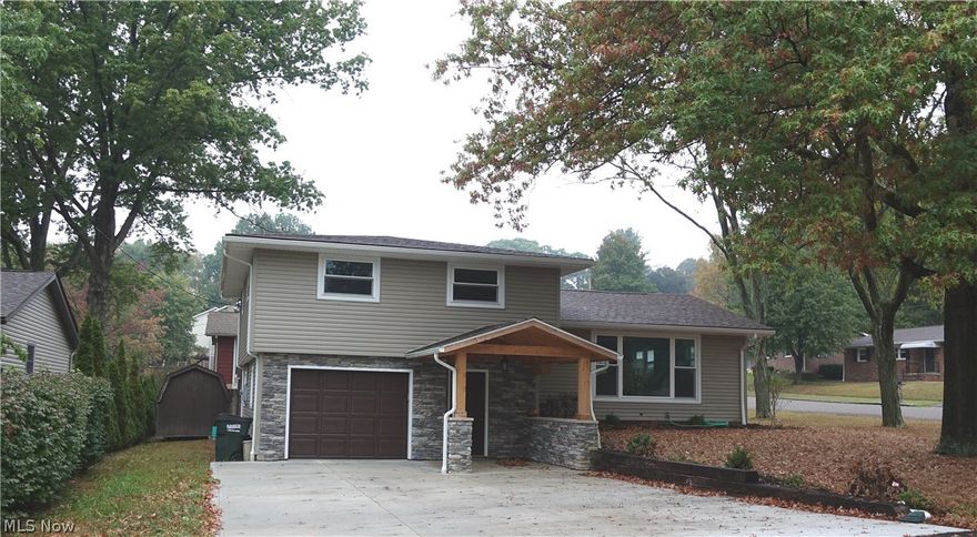 Impressive home in a great Dover location! This tastefully remodeled split level is just like brand new. There are 3 nice size bedrooms, 2 full baths and a great open concept floor plan. The brand new custom kitchen is equipped with all new stainless steel appliances. The dining room has a patio door that extends out to a back deck. The living room has a large front window that lets in a lot of natural light. The family room has a corner fireplace and a door out to a large covered patio area. There are lots of built in cabinets and closet space throughout. The outside has an attractive cedar and stone entryway along with a cement drive. This home sits on a 80x100 corner lot and is an ideal location close to all amenities and will allow for immediate possession.