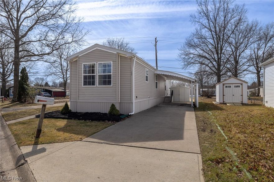 COLUMBIA PARK IS A 55 AND OLDER CONCEPT OF LIVING and is Ohio's Premiere Adult Land Lease Community! Amenities include: Gatehouse managed entrance! On site Shopping Plaza! On site Management! Walking Path/Dog Walking Path! Shuffleboard! Bocce Ball! Library! Crafts, and Social Hall!  WELCOME HOME to this adorable 2002 Castle Single Wide Manufactured Home.  This home offers 840 sqft. measuring 60 x 14 featuring 2 Bedrooms, 1 Bath, Living Room and a very nice eat in kitchen.  Lots of windows allowing all of that natural light to filter in.  All appliances stay including the washer and dryer.  The eat in kitchen flows into the living room allowing that open concept feel.  This has a little different floor plan than most.  Most ages are unknown other than the HVAC System is 2 years old and most of the home has new carpeting.  They say great things come in small packages!!!!!!!!   Don't let this one get away from you.....