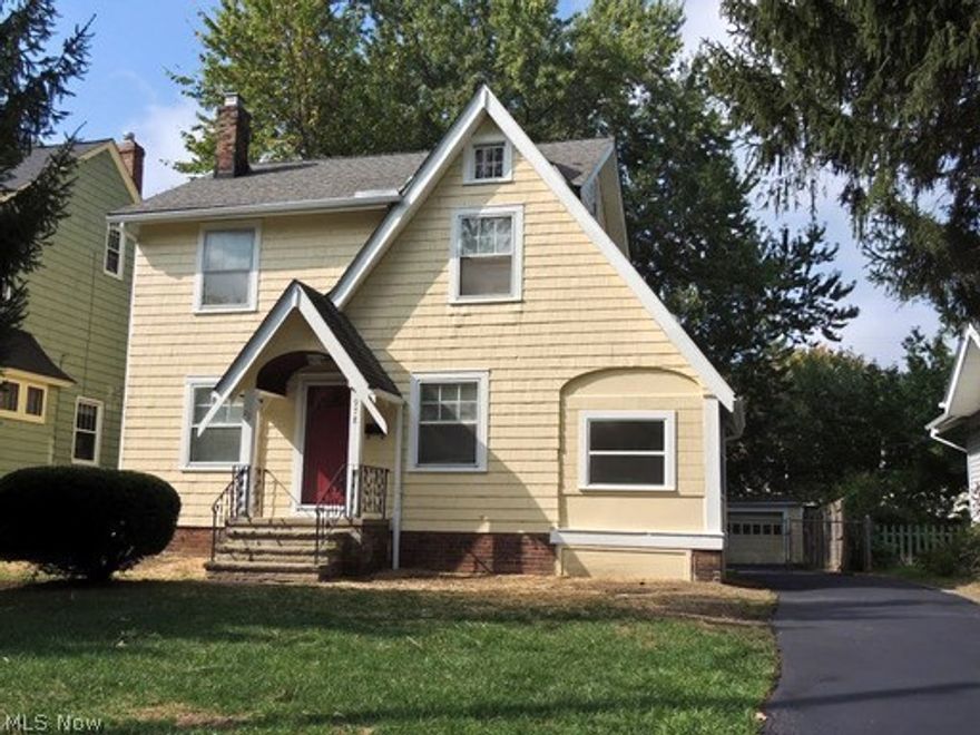 This Colonial has been beautifully renovated and features 3 bedrooms with 1 full bathroom. Sun room off the side. Living room with a wood burning fireplace. Kitchen with built-in cabinets and eat-in area. Formal dining room with built-in china cabinets and a window sitting bench. Finished third floor. Unfinished basement. 1 car detached garage. Newer deck off the back. Fenced in backyard. This property is located in Cleveland Heights, Ohio and offers approximately 1,188 square feet of living space.