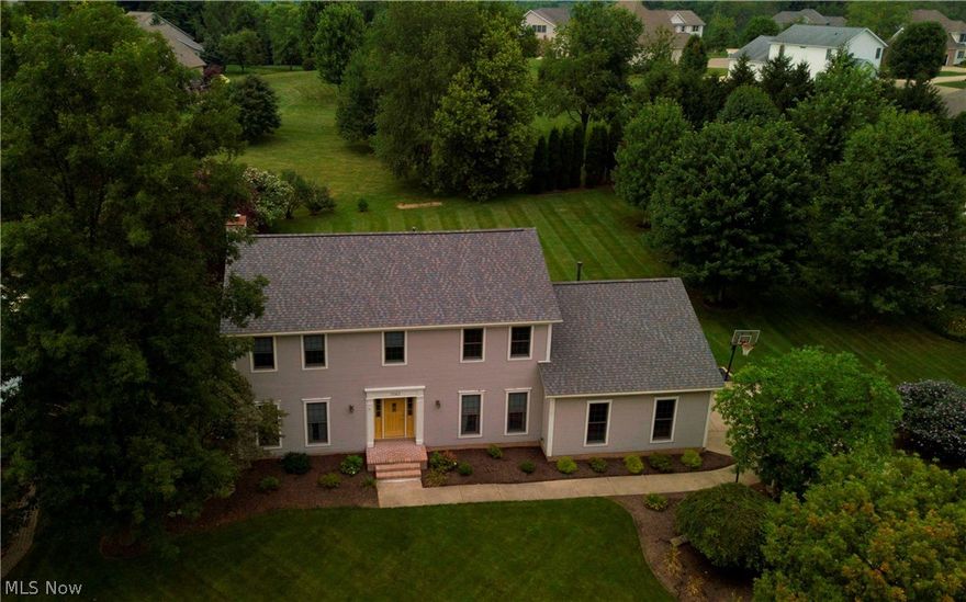 Priced to sell - so don't miss this opportunity! Lovely Wellington Woods home offers lots of living space on a very nice 1/2 acre lot and setting. The interior is neutral, with many nice features that include a 1st floor Office, 1st floor Laundry, open floor plan to the Kitchen and Family Room. Recent updates include a new roof and CAC in 2017,  Hot water tank and softener in 2014. There's a separate formal Living Room and formal Dining Room, along with a beautiful wood Foyer entryway, and a total of 4 Bedrooms. The Master Bedroom and Master Bathroom are generously sized, with a walk in closet, shower and tub. The home's neutral basic decor is all ready for you to add your decorating touches and personality. And at this price, there's room to make your personal upgrades down the road in a neighborhood of higher priced homes. Private backyard with no immediate neighbors in back has a small Patio and is a clean slate to add whatever you envision for your backyard paradise. The home inclu