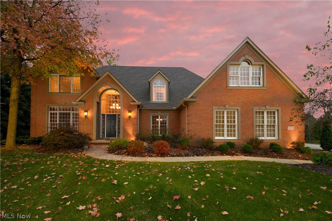 A phenomenal quality built 2 story situated on Raintree Golf Course w/tree lined lot having 4 bedrooms, 4 full baths, 3392SF plus 1200SF in finished lower level*Throughout home are beautiful windows, many w/transom, huge Palladium in foyer, 9' ceilings 1st floor, double crown molding (1st floor, except living room & upper hall), wood floors (foyer, kitchen, dining, hall & half bath), poplar trim & 6 panel doors plus a split stair case leading from foyer & kitchen*1st floor with sunken great room & brick gas log fireplace; formal dining with tray ceiling; living room; eat in kitchen with newer granite, Schrock maple cabinetry, built in china cabinet, desk, pantry, island, bay window, fully applianced & slider leading to brick patio; office or 5th bedroom; full bath; laundry w/ cabinet & sink (area for built inironing board)* 2nd floor with spacious master suite with walk in closet, double vanity, jetted tub, shower with 2 shower heads & private lav; 3 additional bedrooms (2 w/walk in c