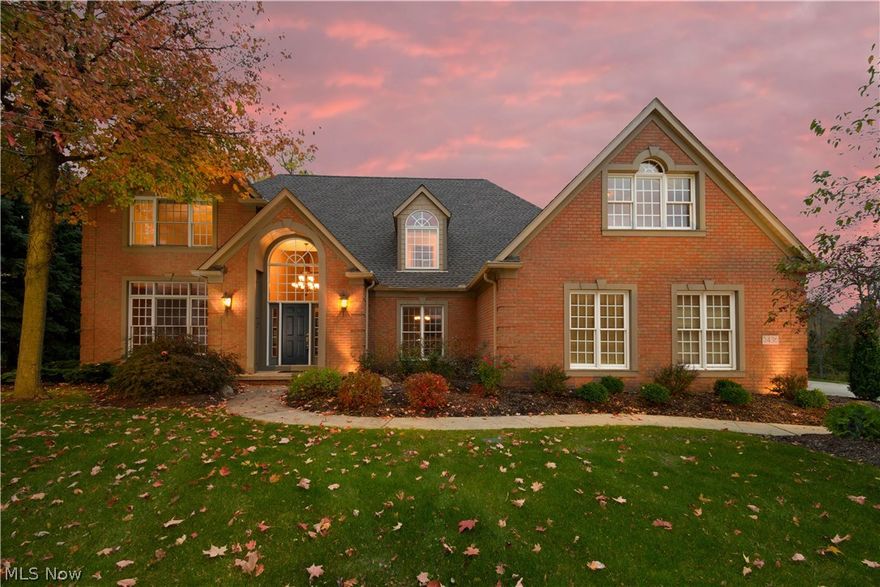 A phenomenal quality built 2 story situated on Raintree Golf Course w/tree lined lot having 4 bedrooms, 4 full baths, 3392SF plus 1200SF in finished lower level*Throughout home are beautiful windows, many w/transom, huge Palladium in foyer, 9' ceilings 1st floor, double crown molding (1st floor, except living room & upper hall), wood floors (foyer, kitchen, dining, hall & half bath), poplar trim & 6 panel doors plus a split stair case leading from foyer & kitchen*1st floor with sunken great room & brick gas log fireplace; formal dining with tray ceiling; living room; eat in kitchen with newer granite, Schrock maple cabinetry, built in china cabinet, desk, pantry, island, bay window, fully applianced & slider leading to brick patio; office or 5th bedroom; full bath;  laundry w/ cabinet & sink (area for built inironing board)* 2nd floor with spacious master suite with walk in closet, double vanity, jetted tub, shower with 2 shower heads & private lav; 3 additional bedrooms (2 w/walk in c