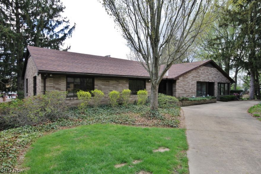 One of a kind home that you don't find often! This is NOT your standard ranch home, you will be sure to enjoy truly unique features that will be sure to amaze you from the beautiful built ins, to the sensible use of space throughout the home. You will appreciate tons of living space with over 2500 sq. ft on the main floor, and not including the finished basement!  First floor library/den that overlooks a park like setting in the rear of the home, with private deck AND enormous sunroom. Wood and tiled floors throughout, marble window sills, and beautiful cathedral ceiling.  Oversized finished walkout basement with additional fireplace, family room, 4th bedroom with half bath. This home has so much opportunity to truly make it fascinating and add your own touch, while highlighting the character that has been highlighted through the craftsmanship.