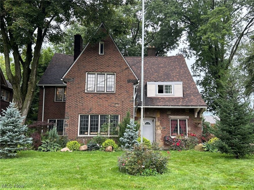 Beautiful full brick English Tudor style home that can be restored to its original state. There are some repairs and updates needed. Sunroom has many windows to let in natural light, living room has a large fireplace, and a formal dining room with the kitchen nook (which is in need of repairs) that are unique. Oversized garage. Come see this diamond in the rough. Sold "AS IS"