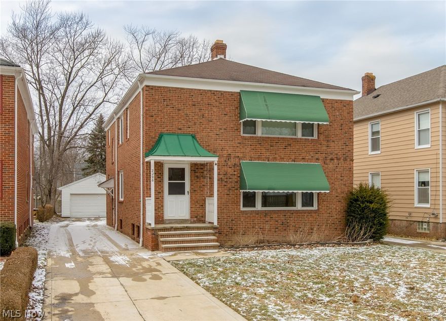 Impeccably clean and well maintained double on wooded University Heights street. This brick 2 suite home could be owned as an income property, or owner occupied with income! Spacious main rooms are carpeted and painted in neutral tones. Living room has a big picture window to let in lots of light, while dining room has built-in cupboard. Eat-in kitchen includes all appliances. Sun-room addition could be an office, den or play room. 2 large bedrooms share a full bath. Newer (2000) garage and newer hot water tanks. Convenient to so much including Cedar Center shopping and restaurants, Whole Foods, and Target.