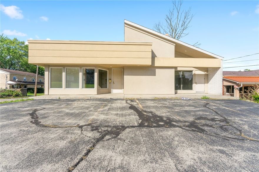 This commercial property presents a versatile opportunity for investors or business owners, offering the potential for either two spacious units on the main level with basement access or up to four units if remodeled, each with its own separate entrance. The building has undergone some remodeling, giving it a refreshed look while maintaining key features. The upper units feature a large open area with a vaulted ceiling, perfect for retail or office space, complete with a storefront and a loft office area that adds a unique touch. Another upper unit could serve as a cozy office or small retail space. The basement offers additional functionality, with a bathroom, ample storage, and two walk-out entries to the back of the building, making it accessible and convenient. With two parking lots—one at the front and another at the rear—this property provides plenty of parking for customers or tenants. Located in a great area, this building is ideal for establishing your business or expanding your rental portfolio, offering a lucrative opportunity with excellent potential. Estimated rental income could generate up to $2000 per month.