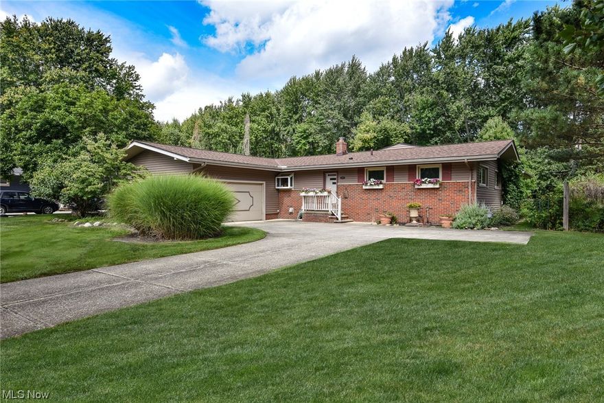 Welcome Home! As you drive up, you’ll immediately notice how well cared for this sprawling Ranch in Olmsted Township is! When you walk in the front door into the foyer, it just feels like home! It offers over 1,800 sq ft, 3 bedrooms, an office or optional 4th bedroom and 3 baths plus a full basement. The updated kitchen has beautiful cherry stained wood cabinetry and hard surface countertops with a seamless sink. The formal dining room is off the kitchen and open to the living room. The view into the backyard from the large living room is phenomenal as seen through the huge picture window! There are hardwood floors throughout the foyer, hallway, living room office and 2 of the bedrooms which just add to the charm and character of the home. The pleasant surprise with this home is not only the size of the home but the feature of the spacious family room with fireplace and master bedroom addition! There are so many possibilities with this space. It is a great option as an everyday space f