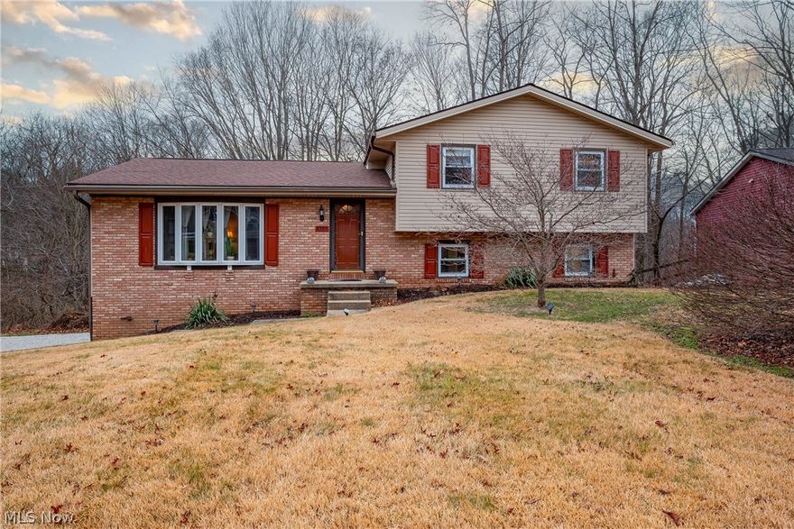 Welcome to this well-maintained home in Scenic Wonderland Hills in Jackson School District.  This 4-bedroom home has had many updates to include new flooring in the laundry room & 4th bedroom (2023), new flooring in upstairs bedrooms 2019, Upstairs bathroom remodeled 2022, new flooring in lower-level family room 2020, vinyl siding (2013), vinyl windows (2016), high efficiency furnace and AC (2016) and an easy water iron shield whole home filtration system. Relax on the deck (built in 2013) and enjoy the view of your very own creek on this beautiful, wooded lot.  Put your mind at ease as sellers are providing a 1-year America's Preferred Home Warranty with your purchase.  Schedule your private showing today!