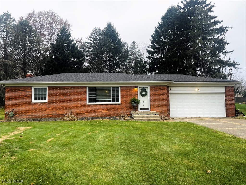Move in ready! Charming 2 bedroom, 1 bath, brick ranch located in Springfield LSD. Newly refinished hard wood floors, new hard surface flooring in bathroom and kitchen, newly painted kitchen cabinets, large two car garage and full basement ready for refinishing! Newer septic, AC unit and breaker panel. Schedule a showing today..this one won't last!