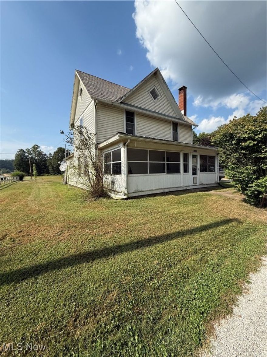 Quiet Farmhouse Living on Half an Acre. Enjoy peaceful small-town charm in this lovely farmhouse set on a beautiful half-acre in a quiet village with stunning countryside views. This home features an updated bathroom, an oversized two-car garage with a bonus hangout space in the back—perfect for hobbies, gatherings, or relaxing. Outside, you’ll find an adorable attached chicken coop with a fenced run, giving your feathered friends plenty of room to roam. Conveniently located between Coshocton, Newark, Mt. Vernon, and Millersburg, you can enjoy both the tranquility of country living and the convenience of nearby towns. Whether you’re sipping coffee on the porch, tending your garden, or watching your chickens wander, this is farmhouse living at its finest.