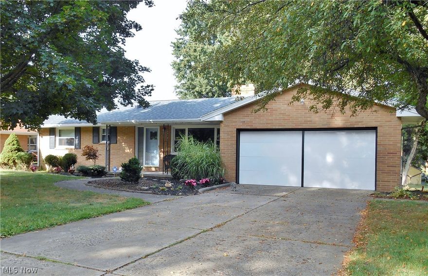 This great 4 bedroom, 3 bath brick ranch has 2 floors of living space with the walk out lower level. The home sits on a 85'X175' lot. The bright eat in applianced kitchen has a skylight and opens to a large deck. The formal dining room has a built in cupboard. The 3 bedrooms and hallway have hardwood floors. The lower level adds 682 sq.ft. of living space and includes the 4th bedroom or office, large family room with fireplace, full bath and sun porch. Some of the many updates are blown insulation (2015), windows (2012), water tank (2007), furnace (2005) and newer roof. The home comes with a home warranty.