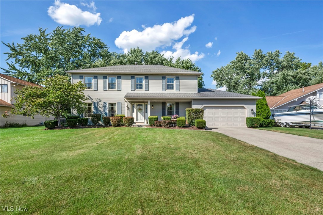 Welcome home to this upgraded and updated spacious Colonial. Notice the soft neutral paint colors and gleaming hardwood floors in the foyer and dining room. The spacious living room opens onto a big family room with a woodburning fireplace for making those cozy evenings memorable. The upgraded eat-in kitchen features granite counters, neutral subway tile backsplash and wood soft close cabinets! All appliances stay and includes a chefs dream gas range! Kitchen wood sliders overlook the patio and entertaining above ground pool! Separate laundry room, behind the kitchen comes complete with washer, dryer and a folding table! A half bath with updated cabinet is adjacent. Upstairs you will find the owners suite with a walk-in closet and dreamy master bath, with separate shower and soaking tub. Three good sized other bedrooms share the updated main bath. The basement has the start of finishing and features lots of storage space, sump and is plumbed for a bath. Enjoy the lovely patio while entertaining friends in your very own pool! Close to shopping and interstates make this Gem of a home the complete package. Just move in and enjoy.