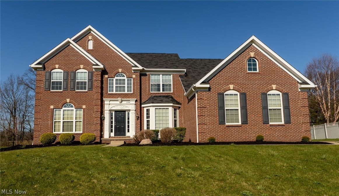 This elegant estate family home sits on a tree-lined street in highly desirable Spring Hill Development and is just minutes to Green Schools, local shopping, medical and dining experiences. A charming entrance, pathway, and landscaped grounds invite you into the front yard. Upon entrance, you are warmly greeted by a beautiful staircase, hardwood floors with a formal dining room to your right and huge home office to your left. The bright and open floor plan seamlessly connects the kitchen to the 2- story family room and leads to the inviting, sunny backyard. Meticulous attention to detail is presented in the kitchen with granite countertops, maple cabinets, and stainless appliances as well as a second staircase leading upstairs. Adjacent to the living room, there’s a fabulous flex room that could become a guest bedroom, second home office, or a toddler’s playroom. Upstairs you’ll find the owners retreat with 3 additional bedrooms and full bathroom. The finished basement is such a bonus