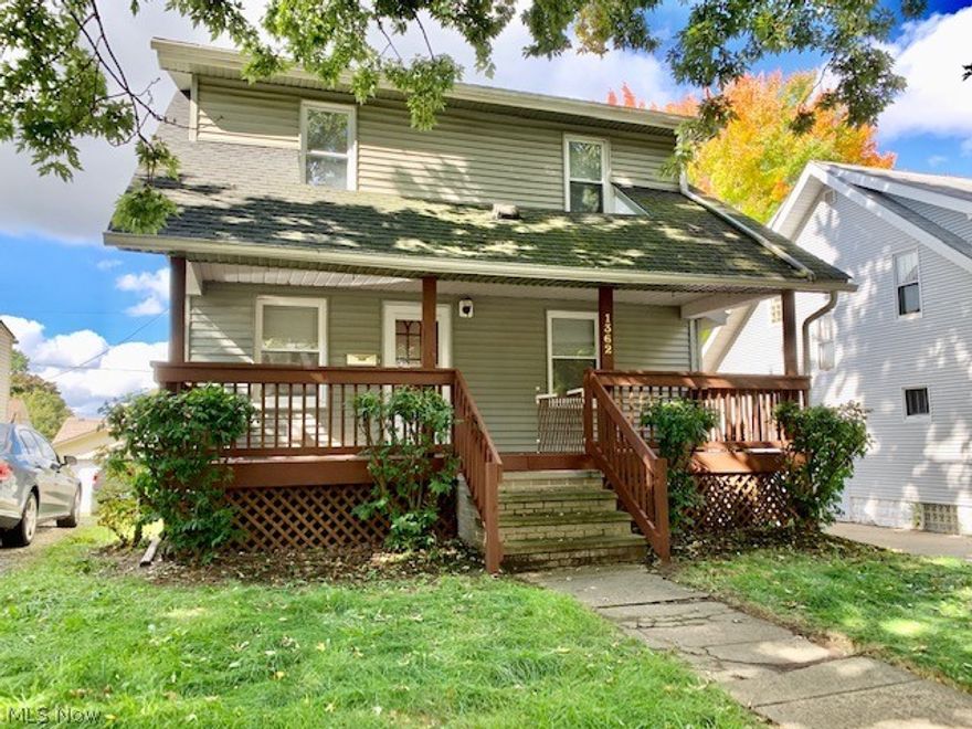 Charming and well cared for colonial Firestone Park! Clean, bright and sunny home with lots of natural woodwork and beautiful built ins.  Eat in kitchen, formal dining room, decorative fireplace, updated bathroom. Great front porch to enjoy! Full basement, including newer furnace and tankless water heater. Oversized detached garage with opener and fully fenced back yard!. Located in a lovely residential neighborhood. Dont miss it!
