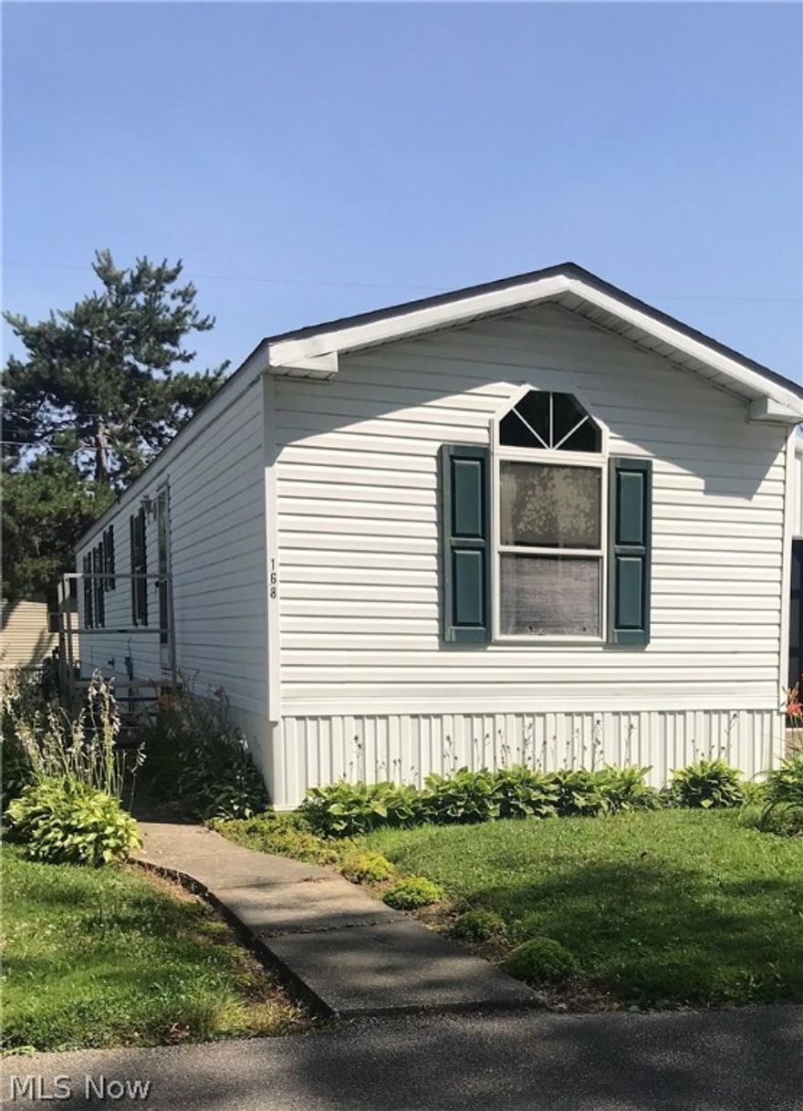 Great opportunity to own this Spacious Mobile Home. This home features 2 full bedrooms--2 full baths. Large open kitchen with stove and refrigerator and lots of storage. The master bedroom is complete with walk-in closet and attached full bathroom. Call for your private showings. (Garage will be torn down).