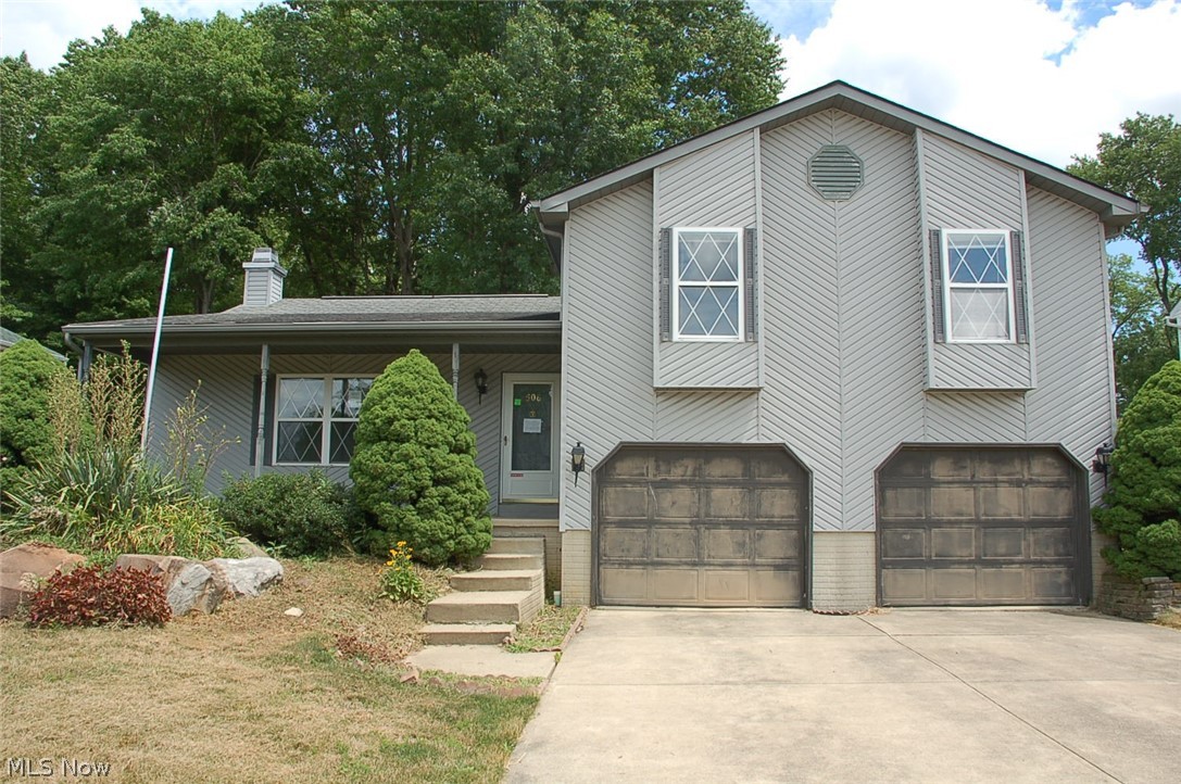 DON'T MISS THIS! So much space for the $$$. Deceiving from the street, this split level home has many features you won't find anywhere else, and with a little time and skill, you can make this home shine!! Spacious living room with custom fireplace, large kitchen with plenty of counters and cabinetry- dining area with crown molding and recessed ceiling- which leads to an AWESOME three season room. The lower level is a family room and half bath, PLUS, there's a basement that offers a huge work room, a rec room and a possible den or office. The fenced yard and storage shed are just a bonus!