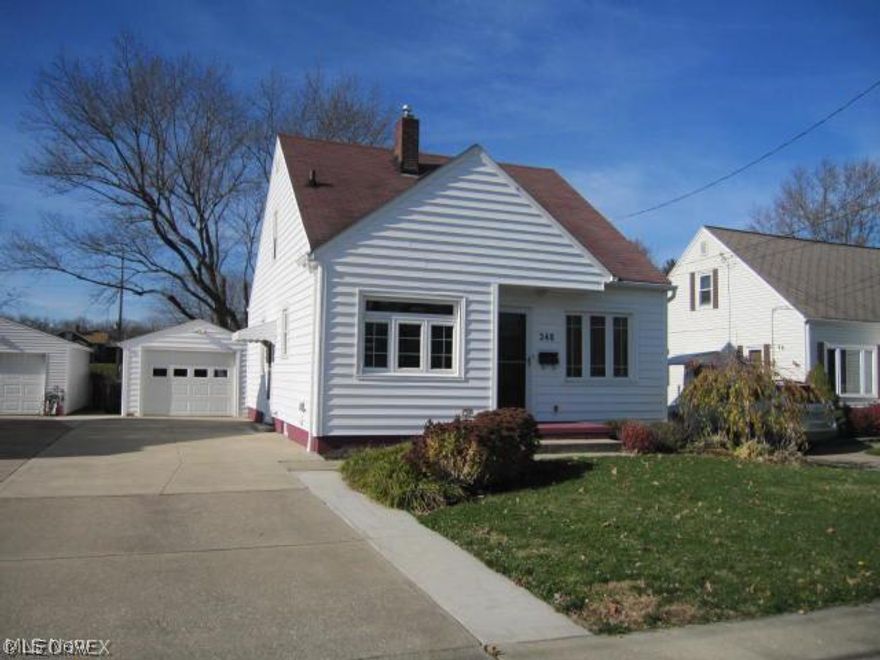New Vinyl Siding. Revere Brand Bead Board Extra thickness installed 2008 w/50 yr Warranty. All new Simonton Vinyl Replacement Windows throughout. Lifetime Warranty. Low-e Double Hung. Completely Remodeled Kitchen in 2004. All new white cabinets. All Appliances including Microwave and Dishwasher plus Gas Range. Refrigerator New in 2012--Bottom Freezer. Genuine Cork Floor in kitchen plus 2 Pantries. All beautiful Oak Hardwood Floors, freshly painted interior w/ fashion colors. Completely Remodeled Bath in 2001--Down to Studs. Gorgeous Counter and Stainless Sink, Linen closet and Cork Floor. Rec Room in Basement has built In Cabinets and Auxiliary Fireplace type Heater (Gas). 90 % Efficient furnace and A/C Installed in 2004. New 50 Gallon Hot Water Tank Installed in 2007. Extra Stove and Double Laundry Sink and Cabinet in Basement. Beautifully Mostly Fenced Back Yard Would Be Easy To Enclose. Professionally Landscaped Front and rear. 3/4 of Driveway Replaced w/ Concrete in 2004.