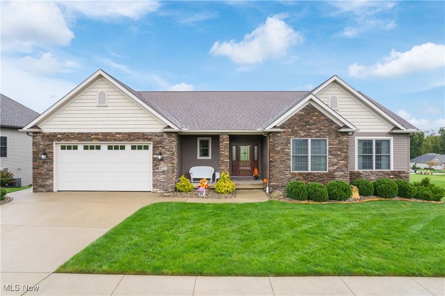 Exquisite. Classy. Functional. Just a few words to describe this meticulously cared for custom built Schlabach home. This one is just like new! As soon as you enter the foyer, it won’t take you long to see the perfection in workmanship, quality materials and design that were put into this spacious, open concept floor plan ranch home. The main level features rich, hardwood flooring that leads you through the large great room with beautiful, stone accent electric fireplace, dining area and the most impressive, functional kitchen complete with island bar seating, stainless steel appliances, huge walk-in pantry and gorgeous quartz countertops. A bright and cheery sunroom, full laundry room, owners suite with tiled shower, double sink vanity and walk-in closet. Two more bedrooms and the guest bath complete this floor. As if that isn’t enough, enjoy the lower walk-out level with finished recreation room, large bonus room perfect for an office, craft, exercise room or potential fourth bedroom, half bath and large storage area. French doors lead you to the meticulously groomed back yard and concrete patio. Enjoy watching sunsets from your very own front porch and plenty of space to utilize in your 2 car garage with bump-out, just perfect for a workshop or extra storage space. This stunning home won’t last long. Call for your private showing today!