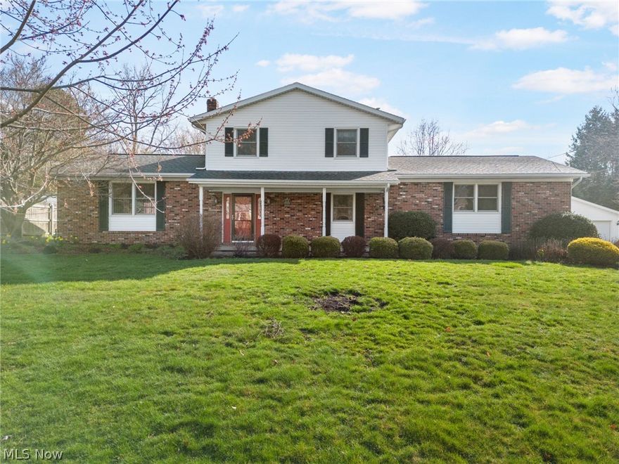 This exceptional property, custom-built Skip Rea, is a haven of comfort and style. Nestled against a 5-acre park, the location is idyllic, offering a serene backdrop. Energy-efficient with newer vinyl windows, the interior features stunning natural wood floors and an Amish-built cherry kitchen with granite countertops. The 5-car garage, including a heated 2-stall section with ample cabinets, caters to both storage and convenience. Outdoors, a maintenance-free deck equipped with two ceiling fans provides a perfect spot for relaxation. Modern conveniences include central vacuum and a gas fireplace in the family room, adding both functionality and charm. The fourth bedroom has been ingeniously converted into a first-floor laundry with a great flex space for an in home office, showcasing adaptability. The property boasts meticulous maintenance practices, with the septic system cleaned every two years. The ownership history, being only the second owner, adds a touch of legacy and pride. With quality construction and attention to detail, this home is not just a residence but a testament to craftsmanship and thoughtful design. Overall, it's a unique blend of modern amenities, natural beauty, and timeless elegance, making it a highly desirable place to call home.