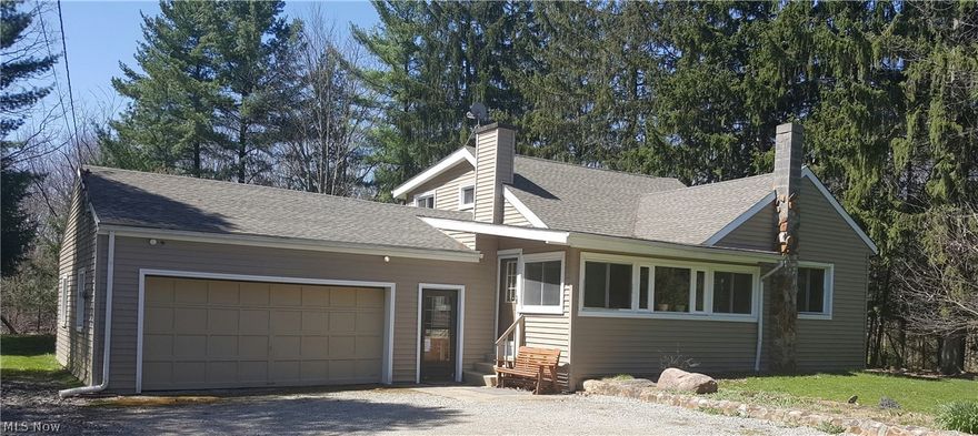 Much Privacy!  Great 3 Bedroom Cape Cod, Nestled Around Beautiful Pine Trees on a 2.39 Acre Lot. Needs Some Finishing Touches But Much Potential & A Great Opportunity For the Right Buyer.  Sold As Is With Buyer To Assume Tie In To City Sewer or Replace Septic Which The County Requires but not immediate.   Home Sits Approximately 600 Feet From The Road, Long Driveway With Turnaround.  Attached 2 Car Garage With Large Breezeway. Great  Private Backyard With Storage Shed and Hot Tub...Yard Extends Into Woods to Other Side of Hill.  Nice Open Floor Plan, Eat In Kitchen With Laminate Flooring.  Spacious Living Room, Sun Room With Gas Fireplace.   Large Updated Full Bath, First Floor Master Bedroom With Large Hall Closet.  2 Tandem Bedrooms Upstairs With A Half Bath & Shared Walk In Closet. Unfinished Walk Out Basement, Newer Hot Water Tank, Updated Electric Panel, Vinyl Windows, Newer Roof.  Financing Options Cash or Rehab Loan.....Straight Conventional or FHA Will Not Finance This Home,  C