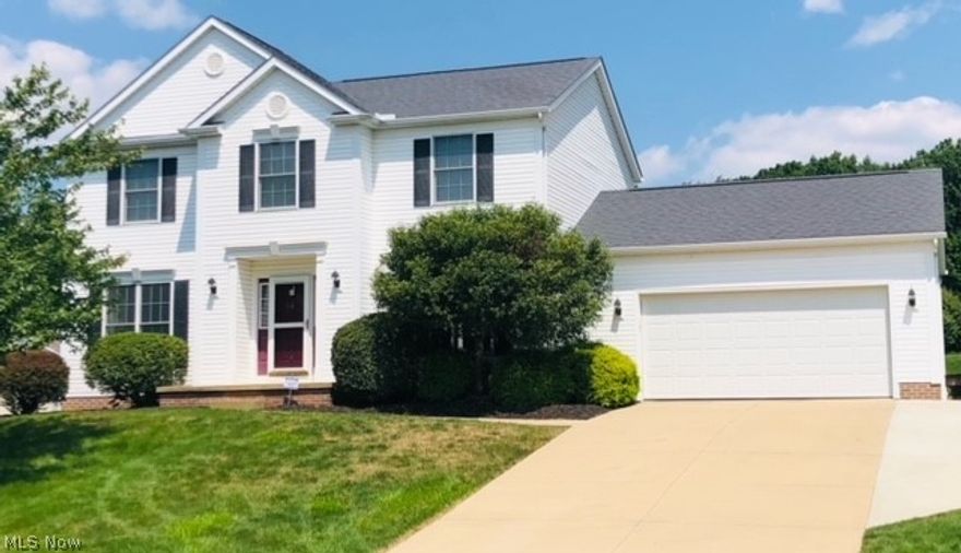 Welcome to this beautiful, well maintained sparkling North Canton Colonial!!! 3 bedroom 2 full and 1 half bath. Open kitchen off 2 car garage and first floor laundry. Dining area for family get togethers and Great Room with gas stone fireplace. The second floor has an oversized Master Bedroom with vaulted ceiling and walk in closet. With additional 2 large bedrooms with also spacious closets. Master Bath has soaking tub, double sinks and walk in shower. Neutral carpet and fresh paint through out home. The finished basement has built in shelves in storage area and office/ 4th bedroom with closet. Lots of entertainment space. Beautiful landscaping with deck, concrete patio, and shed. Updates: Hw tank 2018, radon mitigation system, fresh paint, concrete driveway and patio. Home close to shopping, highway, and schools. Schedule your showing today!!!