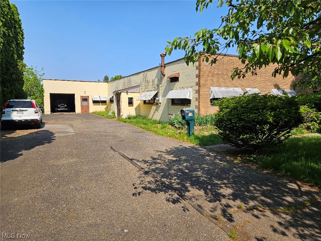 2 Adjoining Auctions in a Convenient Location Near Rt. 8 & Tallmadge, OH. Guardianship Auction. Live Auction with Online Bidding Available. All sells on location. ONLINE BIDDING BEGINS MONDAY, JUNE 26, 2023 – 1:00 PM and AUCTION LIVE ON-SITE BIDDING WILL BEGIN WEDNESDAY – JUNE 28, 2023 – 1:00 PM - AUCTION #1: Features a block & brick industrial building on approx. 4.10 acres. Adaptable to any type of business. The large shop bay has an indoor loading dock & (2) overhead doors, center bay has shop and restrooms plus 2 smaller shop bays. Offices, gas heat, public water & sewer, and gravel lot with room to expand. Producing gas & oil well w/ royalties to the new buyer (last year’s income was approx. $4,500). Also included is a dilapidated bungalow home with (2) decent garages. Parcels #6720633, #6720638, #6720632, #6710785, #6757724, and #6757502. AUCTION #2: Adjoins auction #1 and is located at 1448 Creighton Ave., Akron, OH. Real estate features a cape cod home on a .37-acre lot. The ma