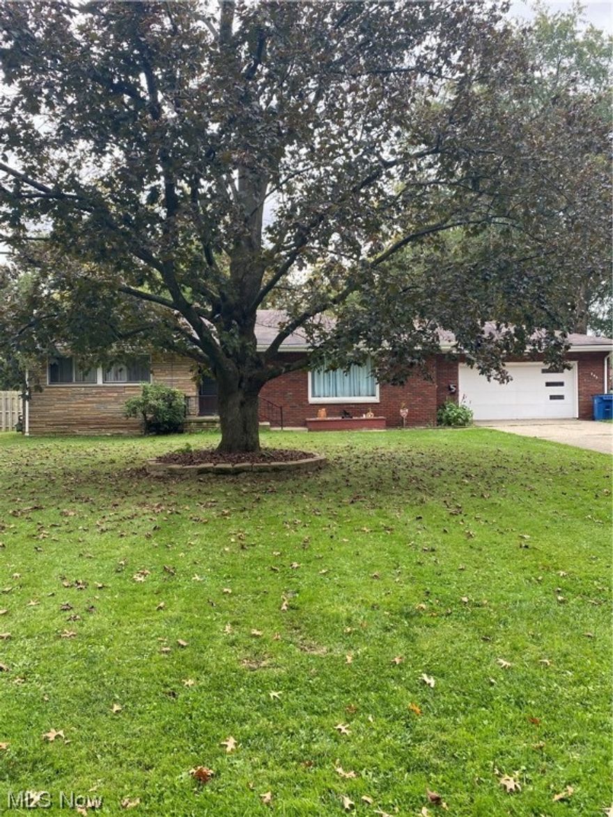 Beautiful 3 bedroom brick ranch on a half an acre that has been completely updated! Beautiful fully-equipped kitchen with gorgeous cabinets and stainless steel appliances. Large living room w/gas fireplace opens to the eat-in kitchen. The 3 bedrooms are spacious w/ample closet space & feature hardwood floors. There are 1.5 baths located on the main floor and an additional half bath in the basement. A large, unfinished basement has a wood burning fireplace & can easily be finished for additional living space. Off the kitchen is a nice covered back porch, a 10x12 storage shed with a loft inside & a completely fenced in backyard. There is also a heated 2 car attached garage. You'll love this home!