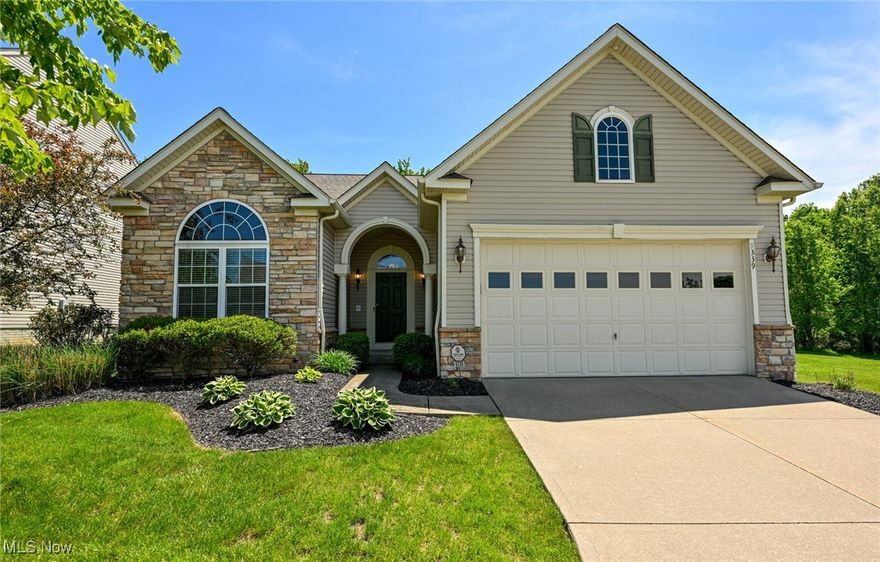 Welcome to this maintenance-free 4 beds, 4 baths home in the desirable Villas of Kensington in Twinsburg! Featuring the highly sought-after first floor primary suite and laundry for effortless everyday living. The main floor has an open-concept design including a large great room and kitchen. The kitchen has granite countertops, a gorgeous large center island, and stainless-steel appliances including a 2022-stainless refrigerator and a 2024-gas double oven range.  The spacious first floor primary suite features a versatile morning room or private office, custom California Closets, and a huge en-suite bath.  A second bedroom, full bath, and a bonus room—ideal for a home office or flex space are also conveniently located on the main level. Upstairs, you'll find two additional bedrooms and a full bath. The fully finished lower level is an entertainer’s dream with a large recreation room, wet bar, surround-sound movie/media room, fitness space, and an additional full bath. There’s also a bonus hobby room, plus ample storage. Step outside to the no maintenance Azek deck, complete with a retractable awning and a gas grill connected to dedicated gas line—perfect for effortless outdoor cooking. Enjoy serene wooded views and the privacy of no rear neighbor making it an ideal setting for relaxation and outdoor living. Additional highlights include a new energy-efficient HVAC system with humidifier and air cleaner (2024), a newer roof with transferable warranty (2023), a hot water tank (2024), glass block windows, an irrigation system, a security system, and all new toilets (2023). Basement Refrigerator and Freezer to stay. In Twinsburg Township with No RITA taxes!  This house is truly spectacular—don’t miss out.  Schedule your private showing today!