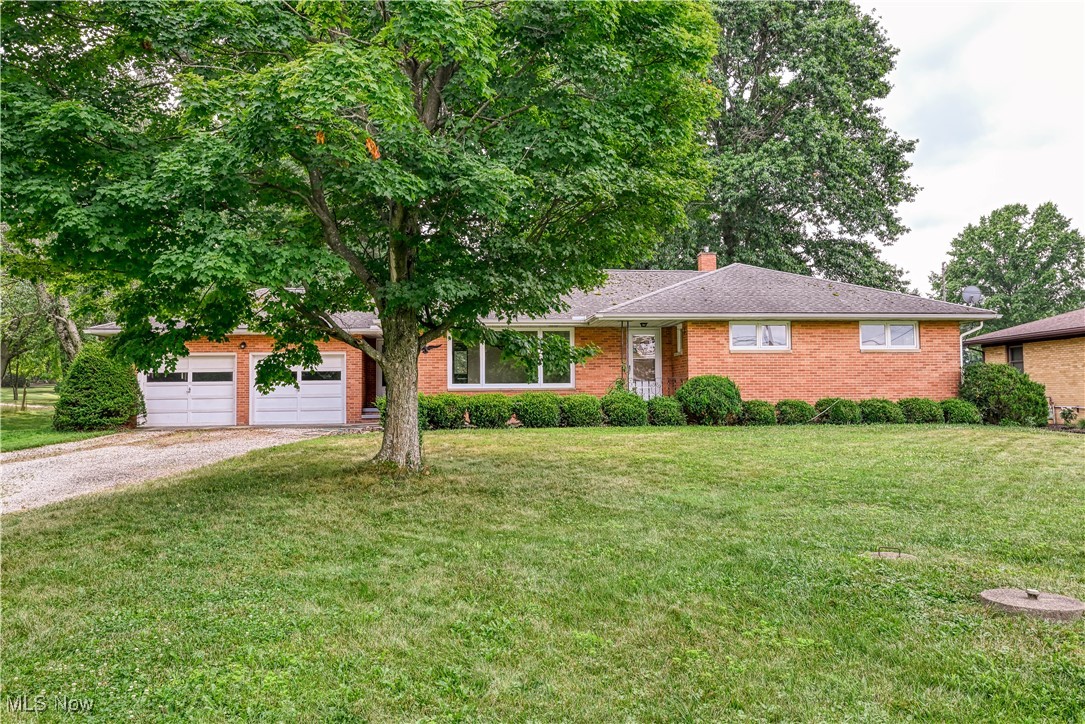 Welcome to 4690 Tallmadge Road. This brick ranch is a great opportunity featuring 3 bedrooms and 1 & 1/2 bath in Rootstown. There is a flowing floor plan boasting a large living room with large bay windows built-ins and a fireplace. The large master bedroom features 2 closets, one being cedar lined and bedrooms 2 and 3 are spacious. The eat-in kitchen features ample storage, a large pantry and beautiful views of the property, which back-up to Rootstown's Community Park. The formal dining room is just off the kitchen and could also be used for other flexible space. There is a full basement with a partially finished section, workshop area, large mechanical area, storage closet, and is plumbed for a shower. Off the kitchen is the half bath leading to the 2 car garage and large driveway all in a park like setting. This property is conveniently located near Neomed and State Route 76. Bring your final touches and make this home your own, all appliances stay, schedule your private showing today!