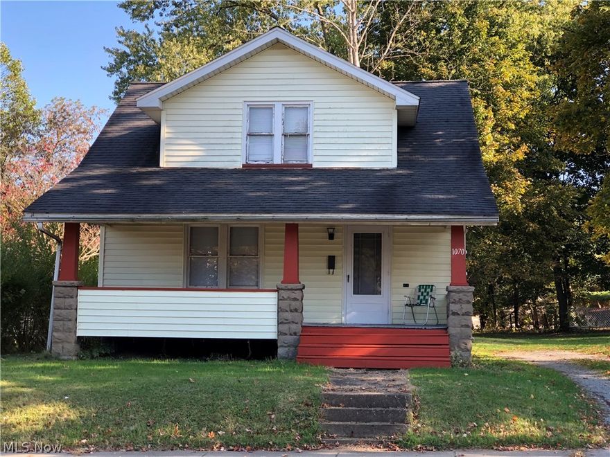 This 1.5 story , 3 bedroom 1 bath home has eat in kitchen with original woodwork, hardwood floors throughout the home.  Roof is approximately 10 yrs old, blown in insulation.  The home also has large front porch, the back has cement patio.  Shed in back yard for storage.  Extra parcel of land being sold with property considered a corner lot.  Great starter home or rental which had been rented for past 20 yrs.