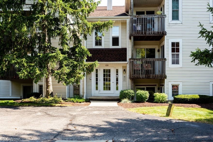 Affordable carefree living! This condominium features a large living room with a wood burning fireplace that is open to the dining room area and kitchen, a large owners suite with a 10 ft. walk in closet, second bedroom, laundry/utility room and your own private patio!  All appliances will be staying including the washer and dryer. Furnace was updated in 2014 and the hot water tank was replaced in 2015. In-ground Pool. Walk to the golf course, library, restaurants and shopping! Easy access to Route 2 and the turnpike. Immediate possession!