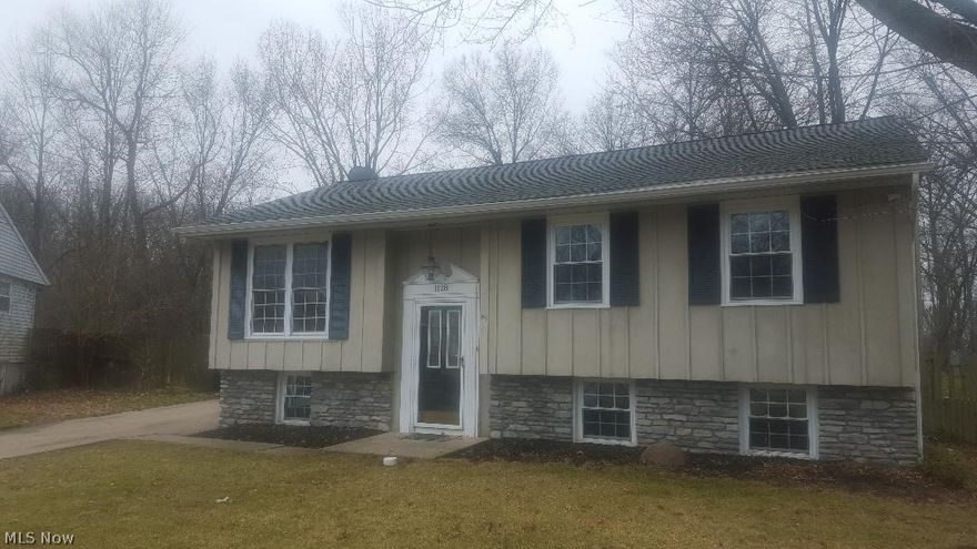 Mint, mint, mint! 4 bedroom 2 bath bi level with all the updates on 2 acres with easy access to shopping, beaches, downtown! Easy access to I-90! This home is ready to move into it includes stove, refrigerator, microwave and dishwasher! All the work has been done! You can relax in the soaking tub in one of the two spacious bathrooms! New roof in 2015 with 30 yr shingles, the 93% two-stage high efficiency furnace with central air is 3 yrs old and a new 50 gallon hot water tank! The 33 ft round pool with new composite deck surrounding  is great for entertaining! You'll love the 2 acre wooded lot and the 2+ car garage! Come view today!!