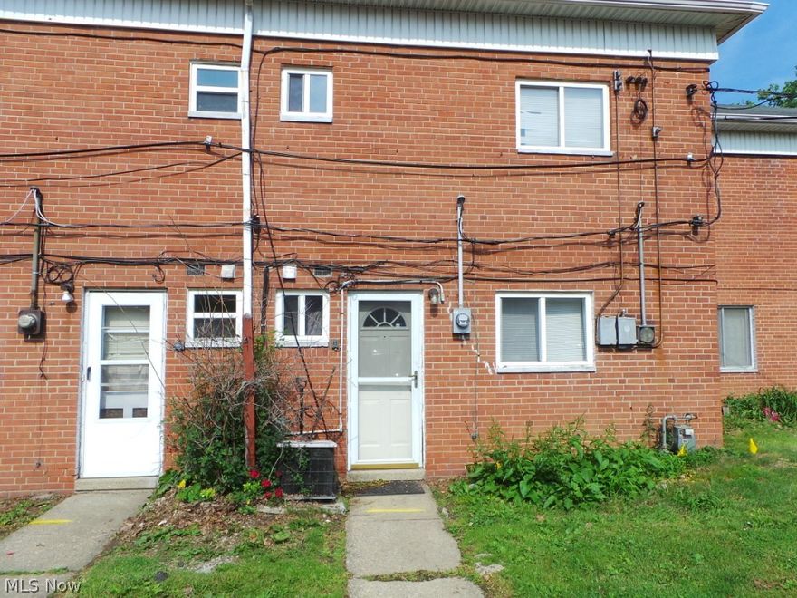 Two bedroom condo offers large living room with tons of natural light, bathroom on main floor and another on upper floor.  Spacious bedrooms with tons of closet space. Close to interstates and tons of amenities.  Property sold AS IS.