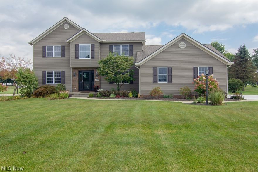 Looking for a beautiful, move-in ready home, close to top-rated schools with plenty of room both inside and out? Then look no further! This incredible colonial in Uniontown has it all and is priced to SELL!! 4 bedrooms; Gourmet kitchen remodeled in 2017 with quartz countertops, soft close cabinetry, stainless steel appliances (including a microwave/convection oven), luxury vinyl flooring and all new light fixtures. The family room has a fireplace at one end and opens directly into the eat-in kitchen. Walk through the sliding doors in the kitchen onto your 16' x 12' TimberTech deck requiring NO maintenance and has LED lighting on the posts, stairs and bench for beauty and safety. Just off the kitchen is the first floor laundry, half bath and 4th bedroom - currently used as an office/den. All three bathrooms have been completely remodeled with marble in the master bath. The full basement is just waiting for your finishing touch. The spacious yard (1.27 acres - WOW) allows plenty of room