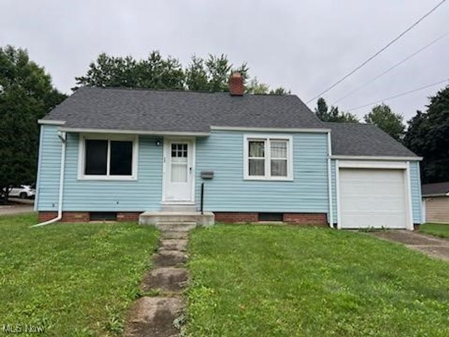 North Canton ranch. 2 bedrooms, 1 bath. Unfinished attic space. Full basement