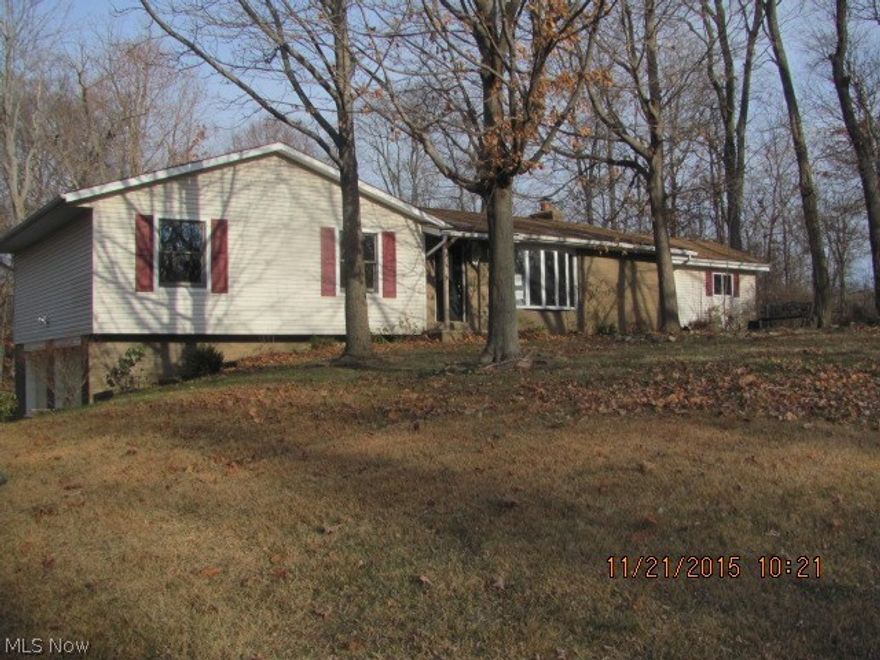 Price Reduced!  Spacious 4 bedroom, 1.5 bath, ranch on a treed lot. Great view of nature off the back deck. Wildlife abounds. The home features an open floor plan, updated kitchen, vaulted family room with fireplace, a large master bedroom with sliding doors to the deck, new carpet and fresh paint.