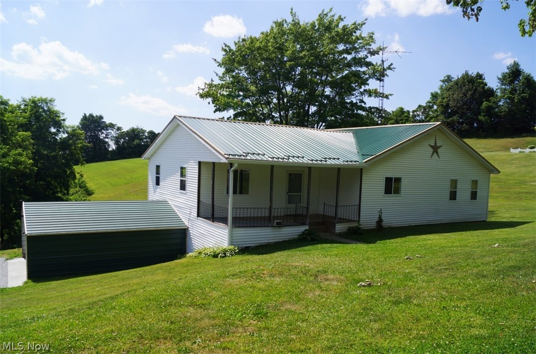 You'll love this 3 bedroom, 1 bath ranch home just one mile out of town with a country setting. Open floor concept offers 1568 sq. ft. of generous living space. Immediate possession with multiple upgrades including metal roof (3 years), kitchen (8 to 9 years) with all appliances, high efficiency furnace (8 to 9 years) with central air. Situated on 2.58 acres and move in ready.