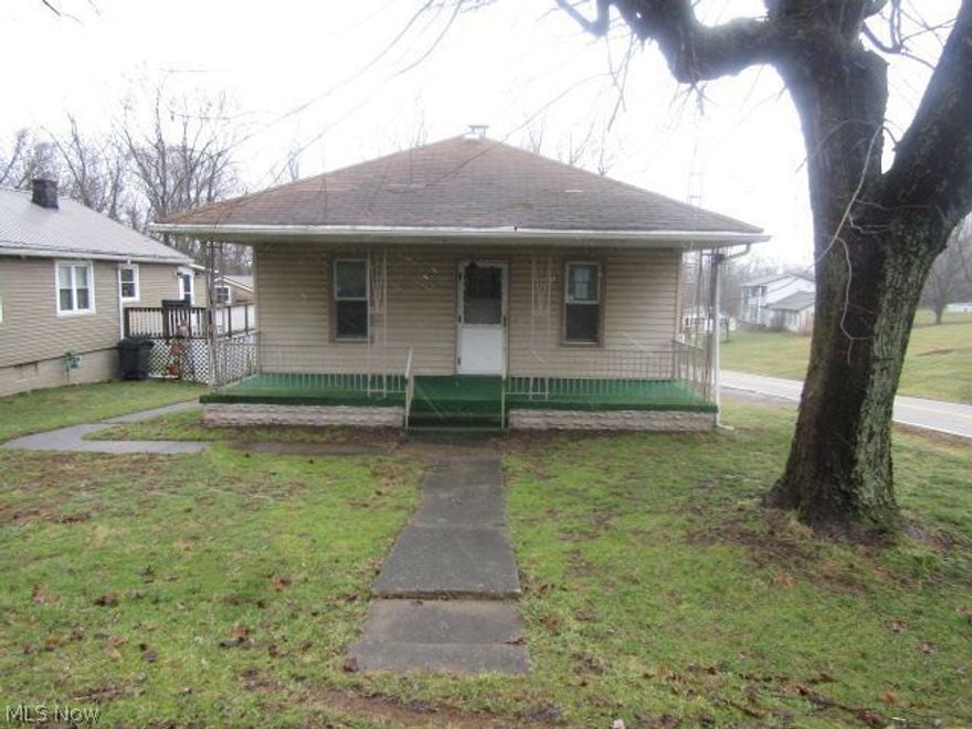 A cozy ranch home is awaiting a new owner.  This 2 bedroom home has an additional bathroom in the basement. The front porch is perfect for relaxing after a long day of work. Bring your vision and remodeling ideas and transform this house into a home.